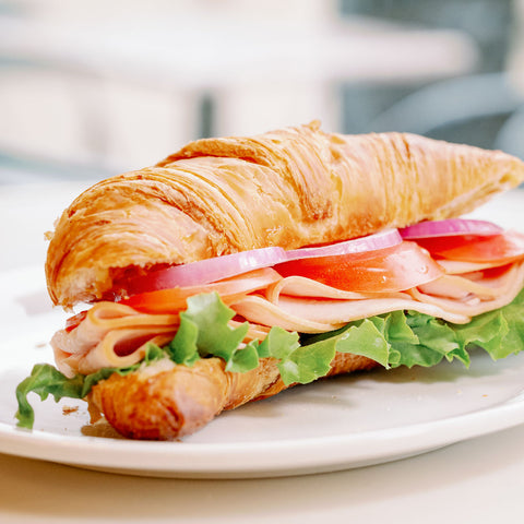 Egg salad croissant sandwich