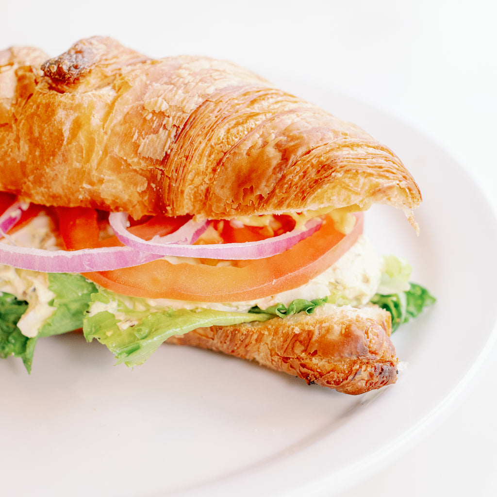 Egg salad croissant sandwich