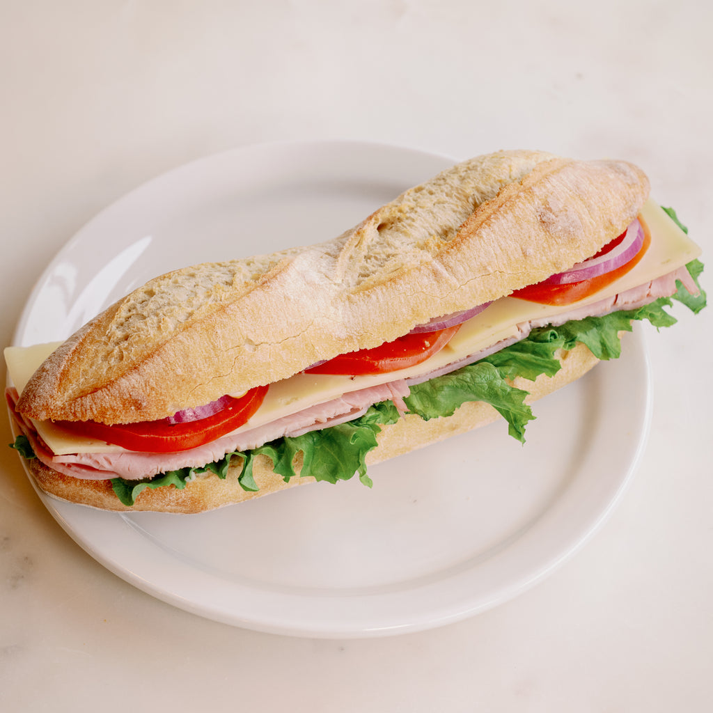 Ham and swiss baguette sandwich