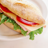 Ham and swiss baguette sandwich